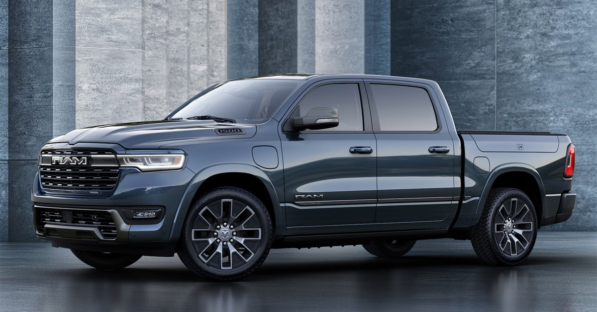 2025 Ram 1500 Ramcharger parked in front of a building