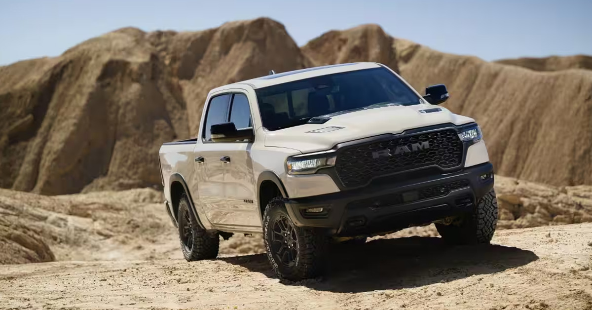 Ram 1500 truck driving on some sandy hill
